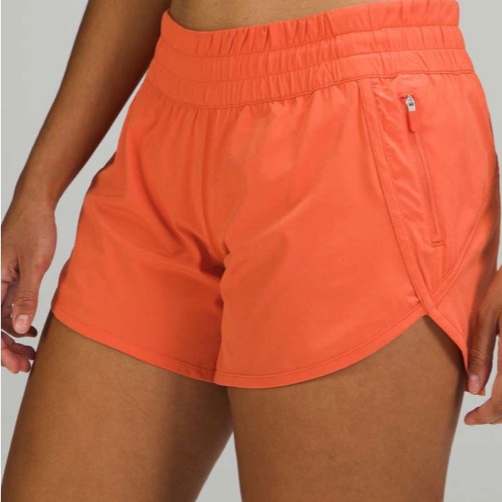 warm coral lululemon tracker shorts